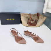 ALAIA 26S THONG SANDALS IN NUDE CALFSKIN
