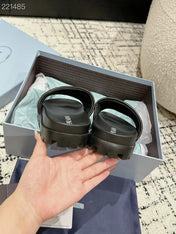 PRADA 25S PADDED SLIDES IN BLACK CALFSKIN WITH LOGO