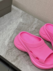 POOL CROCS SLIDE SANDAL IN BRIGHT PINK RUBBER