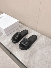 THICK-SOLED SLIDES IN BLACK SMOOTH LAMBSKIN LOGO WITH CRYSTALS