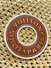 NOÉ PURSE 24 IN BEIGE CROCHETED RAFFIA AND BROWN CALFSKIN TRIM