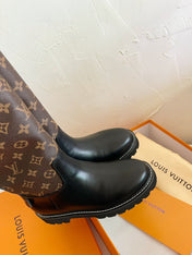TERRITORY FLAT HIGH BOOT IN BLACK MIX CHOCOLATE BROWN MONOGRAM CALFSKIN