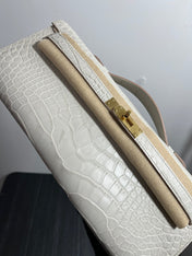 KELLY CUT 31 IN WHITE SHINNY ALLIGATOR LEATHER WITH GOLD HARDWARE