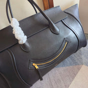 CELINE 25S MEDIUM SMILING NEW LUGGAGE 44MM IN BLACK SUPPLE SHINY LAMBSKIN