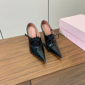 ALAIA 26S LACE-UP HEELED 105 MM IN BLACK GLOSSY CALFSKIN