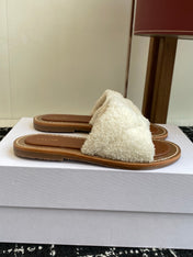 CELINE 26S TRIOMPHE FLAT SLIDES IN WHITE WOOL