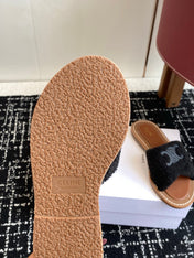 CELINE 26S TRIOMPHE FLAT SLIDES IN BLACK WOOL