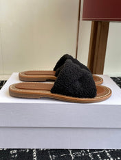 CELINE 26S TRIOMPHE FLAT SLIDES IN BLACK WOOL