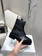 CELINE 26S CHUNKY-SOLE COMBAT BOOTS IN BLACK CALFSKIN