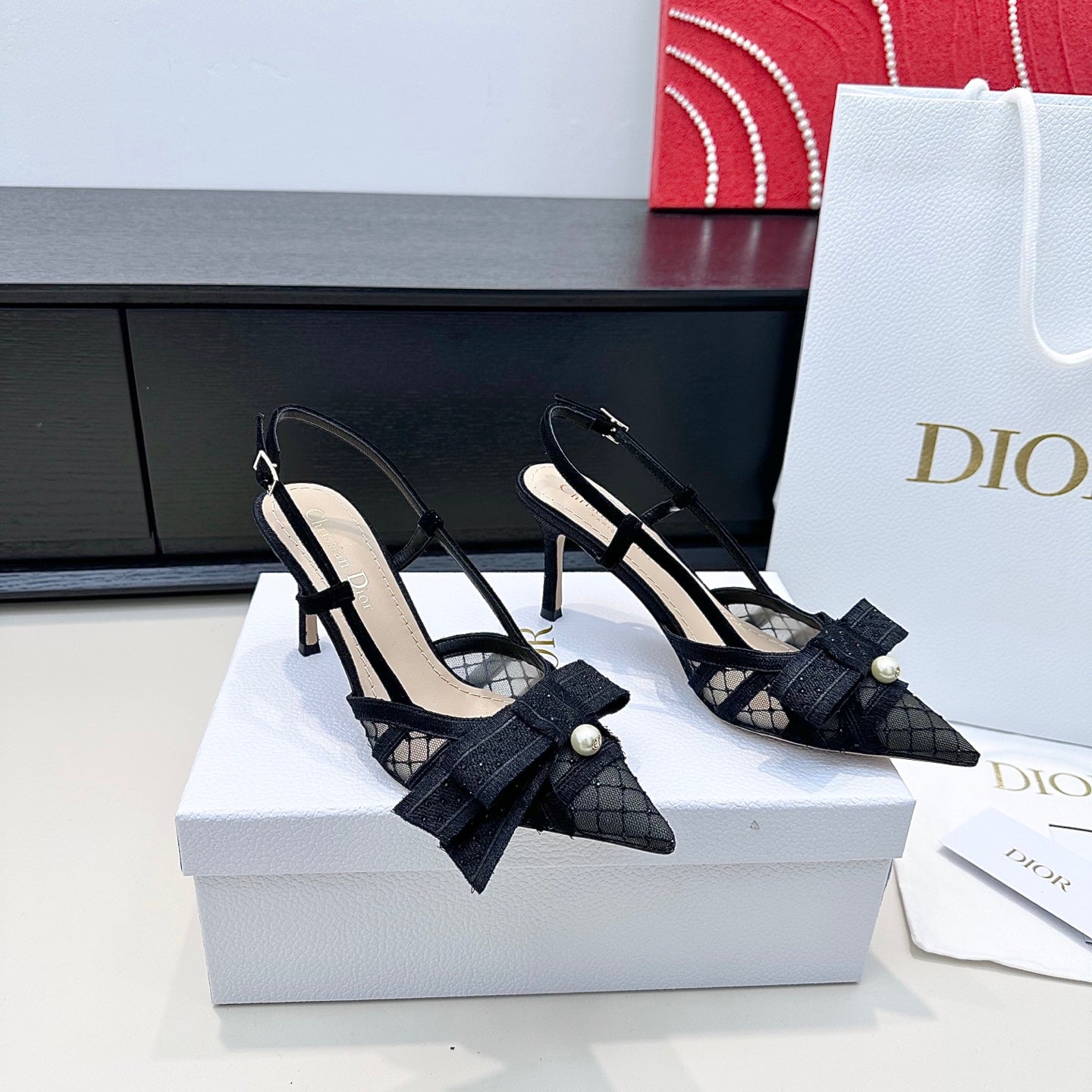 DIOR 26S POINTED TOE HEELED SANDALS 85MM IN BLACK FABRIC WITH PEARL BOW