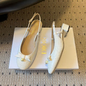 DIOR 26S OPEN BACK SANDALS IN CREAM WHITE CALFSKIN WITH PEARL BOW