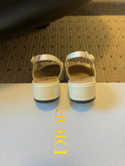 DIOR 26S OPEN BACK SANDALS IN CREAM WHITE CALFSKIN WITH PEARL BOW
