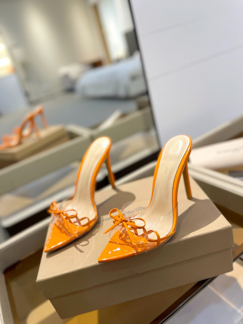 GIANVITO ROSSI 26S HEELED SANDALS 105 MM IN ORANGE PATENT CALFSKIN WITH BOW