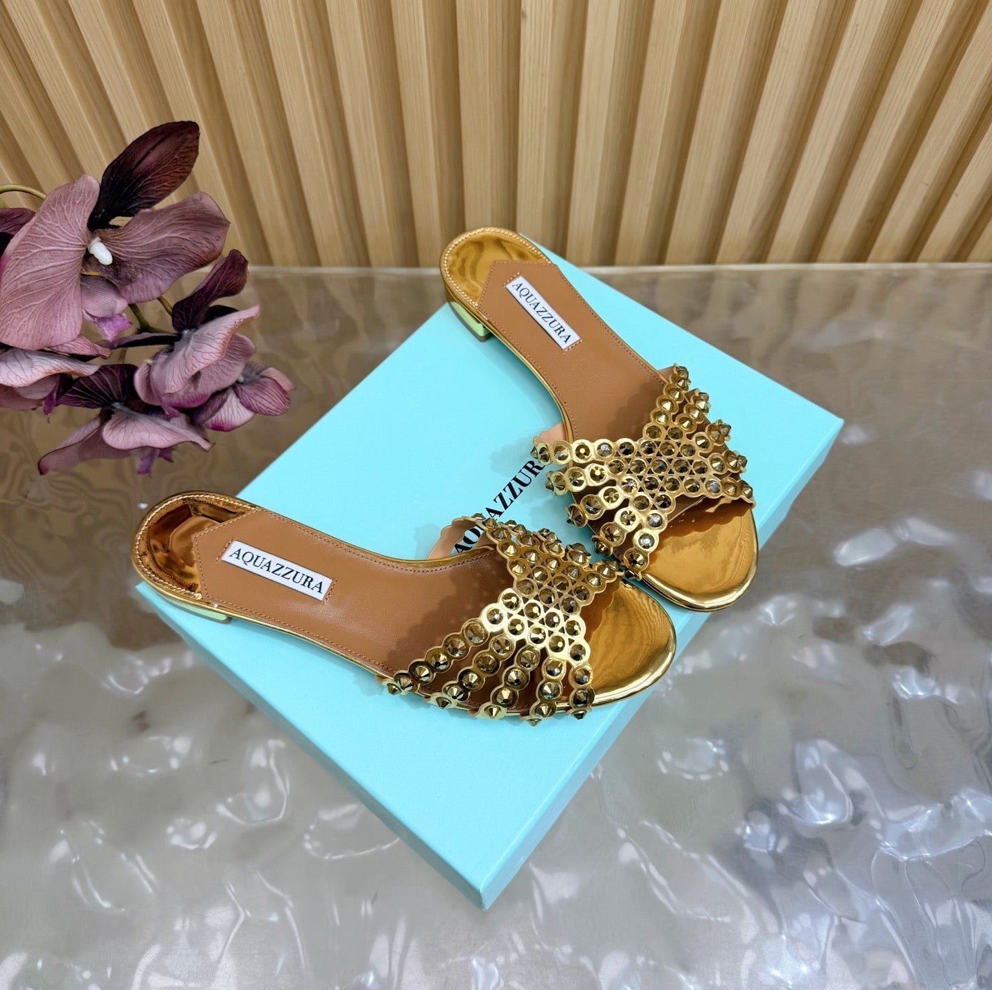 AQUAZZURA 26S SLIDES IN METALLIC GOLD CALFSKIN CRYSTAL-EMBELLISHED STRAPS