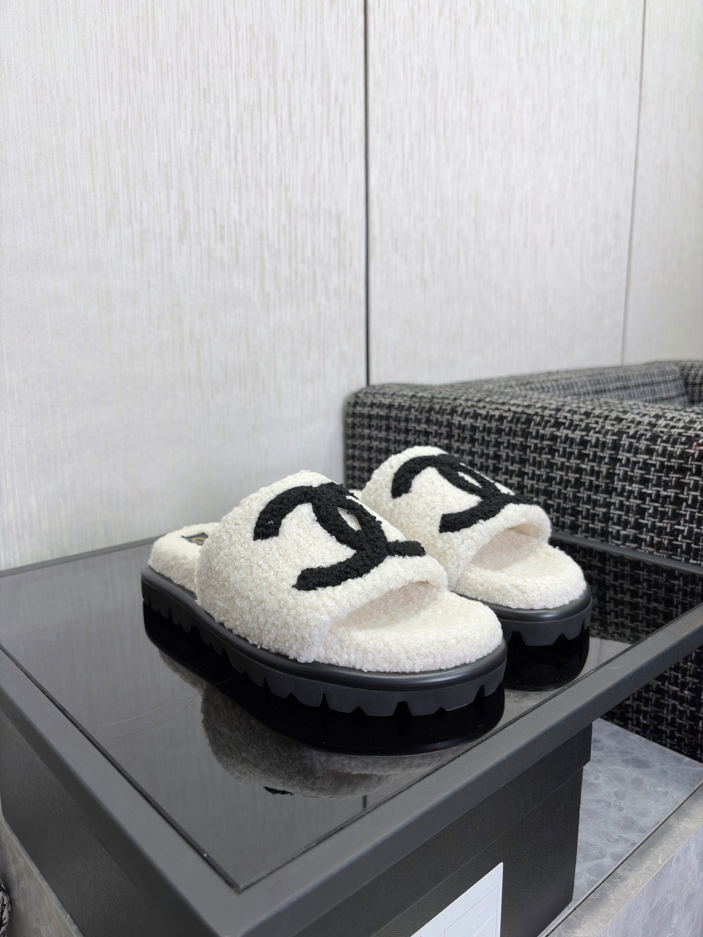 CHANEL 26S SLIDE SANDALS  IN BLACK AND WHITE SHEARLING