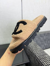 CHANEL 26S SLIDE SANDALS IN BLACK AND BEIGE SHEARLING OPEN TOE