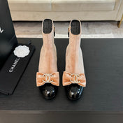 SHORT BOOTS IN PEACH PINK VELVET AND BLACK LAMBSKIN