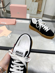 ECRU SNEAKERS IN BLACK SUEDE