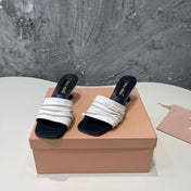 HIGH - HEEL WHITE MIX BLACK SHEEPSKIN WITH STYLIZED STRAPS