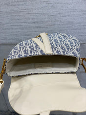 DIOR 25S MINI SOFT SADDLE BAG 19 IN BLUE DIOR OBLIQUE CHAMBRAY AND IVORY SMOOTH CALFSKIN