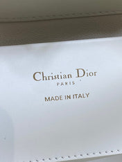 DIOR 25S TOUJOURS VERTICAL TOTE BAG 18 IN IVORY CALFSKIN WITH CHARM BRACELET STRAP