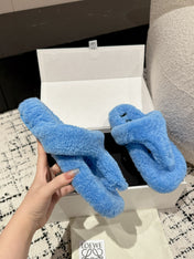 LW SHEARLING THONG SLIPPER IN LAPIS