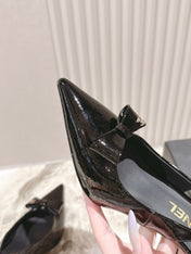 CC HIGH SLINGBACK IN BLACK LAMBSKIN WITH BOW ATTACHED