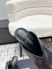CHANEL 26S SQUARE-TOE HEELED MULES 95 MM IN BLACK MIX WHITE LAMBSKIN