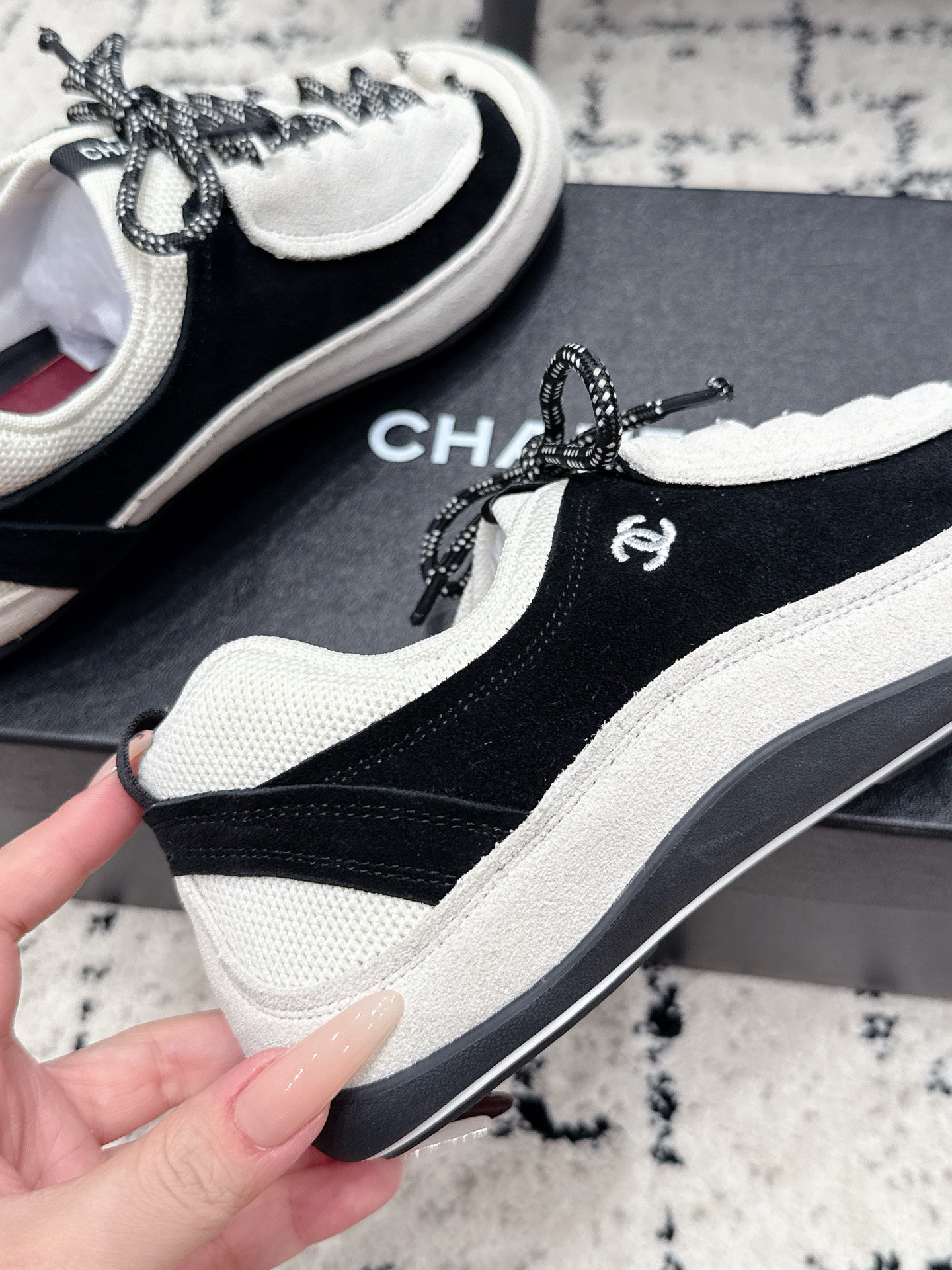 CHANEL 26S LACE-UP SNEAKERS IN WHITE AND BLACK SUEDE STYLE 2