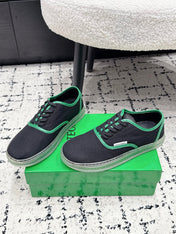BOTTEGA VENETA 26S SNEAKERS IN BLACK AND GREEN CANVAS
