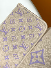 CARRYALL PM 29 BAG IN BEIGE MIX PURPLE MONOGRAM EMPREINTE LEATHER