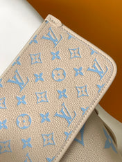 CARRYALL PM 29 BAG IN BEIGE MIX BLUE MONOGRAM EMPREINTE LEATHER