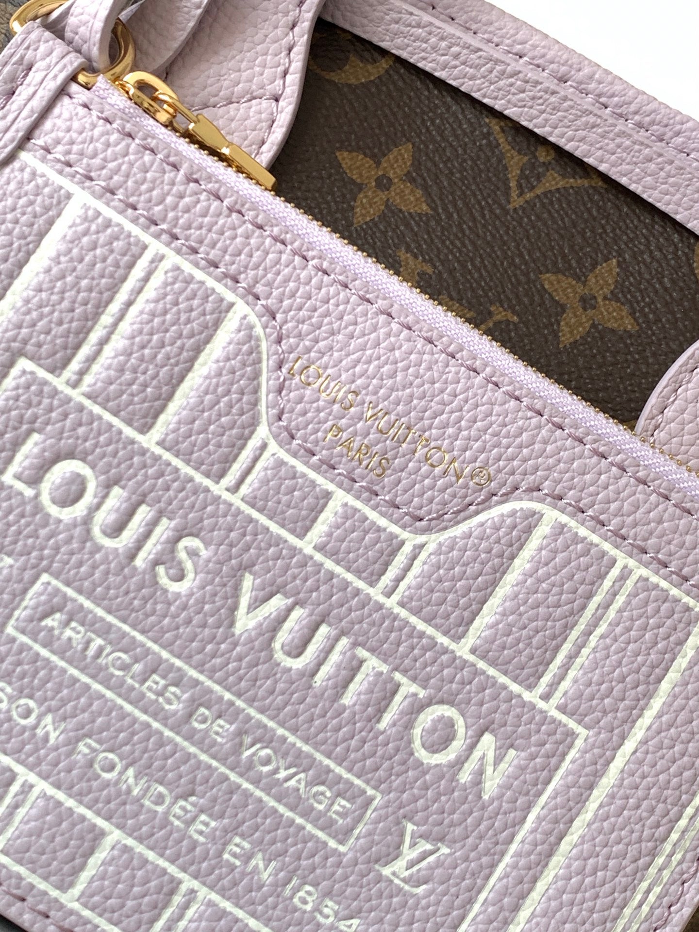 LV 25S NEVERFULL BANDOULIÈRE INSIDE OUT BB 24 IN LIGHT PURPLE AND BROWN CALFSKIN