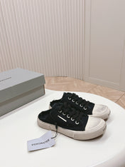 PARIS MULES IN BLACK DESTROYED DENIM AND RUBBER