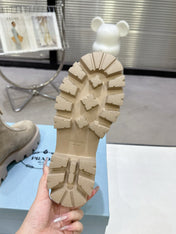 PRADA 25S ZIP-UP ANKLE BOOTS IN BEIGE SUEDE