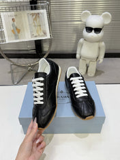 PRADA 26S LACE UP SNEAKERS IN BLACK CALFSKIN