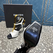 BALMAIN 26S HIGH-HEEL SANDALS 95 MM IN BLACK AND WHITE CALFSKIN