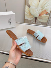CELINE 26S TRIOMPHE SLIDE SANDALS IN SKY BLUE CANVAS