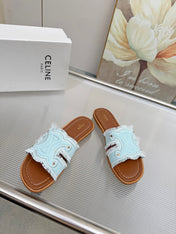 CELINE 26S TRIOMPHE SLIDE SANDALS IN SKY BLUE CANVAS