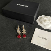 CHANEL 26S DOUBLE C LOGO CRYSTAL & RED TEARDROP DANGLE EARRINGS IN GOLD METAL 629181