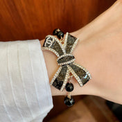 CHANEL 26S CRYSTAL BOW PEARL & BEAD CHAIN BRACELET IN GOLD METAL 629979