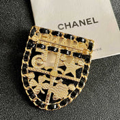 CHANEL 26S NUMBER SHIELD BROOCH WITH MULTI-CRYSTAL DETAIL IN GOLD METAL 631042