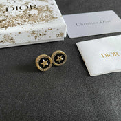 CD 26S STAR MEDALLION LOGO STUD EARRINGS IN BLACK ENAMEL & GOLD TONE METAL 631813