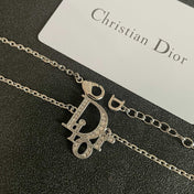 CD 26S CRYSTAL DIOR LOGO PENDANT NECKLACE IN SILVER METAL 631900