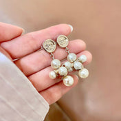 CHANEL 26S CHANEL CC LOGO PEARL CLUSTER DROP EARRINGS IN GOLD METAL 633301