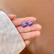 CHANEL 26S CHANEL CC LOGO PAVE CRYSTAL STUD EARRINGS IN PURPLE ENAMEL WITH GOLD METAL 633312