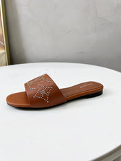 FLAT SLIDE IN BRONZE BROWN LAMBSKIN WITH RHINSTONES