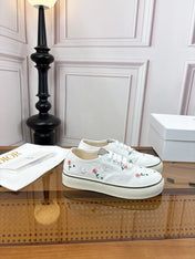 DIOR 26S LOW TOP SNEAKERS IN WHITE CANVAS WITH FLORAL EMBROIDERY