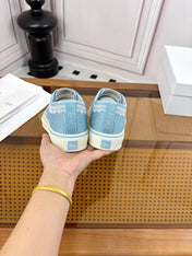 DIOR 26S LOW TOP SNEAKERS IN LIGHT BLUE CANVAS WITH WHITE LACE TRIM & LOGO PRINT