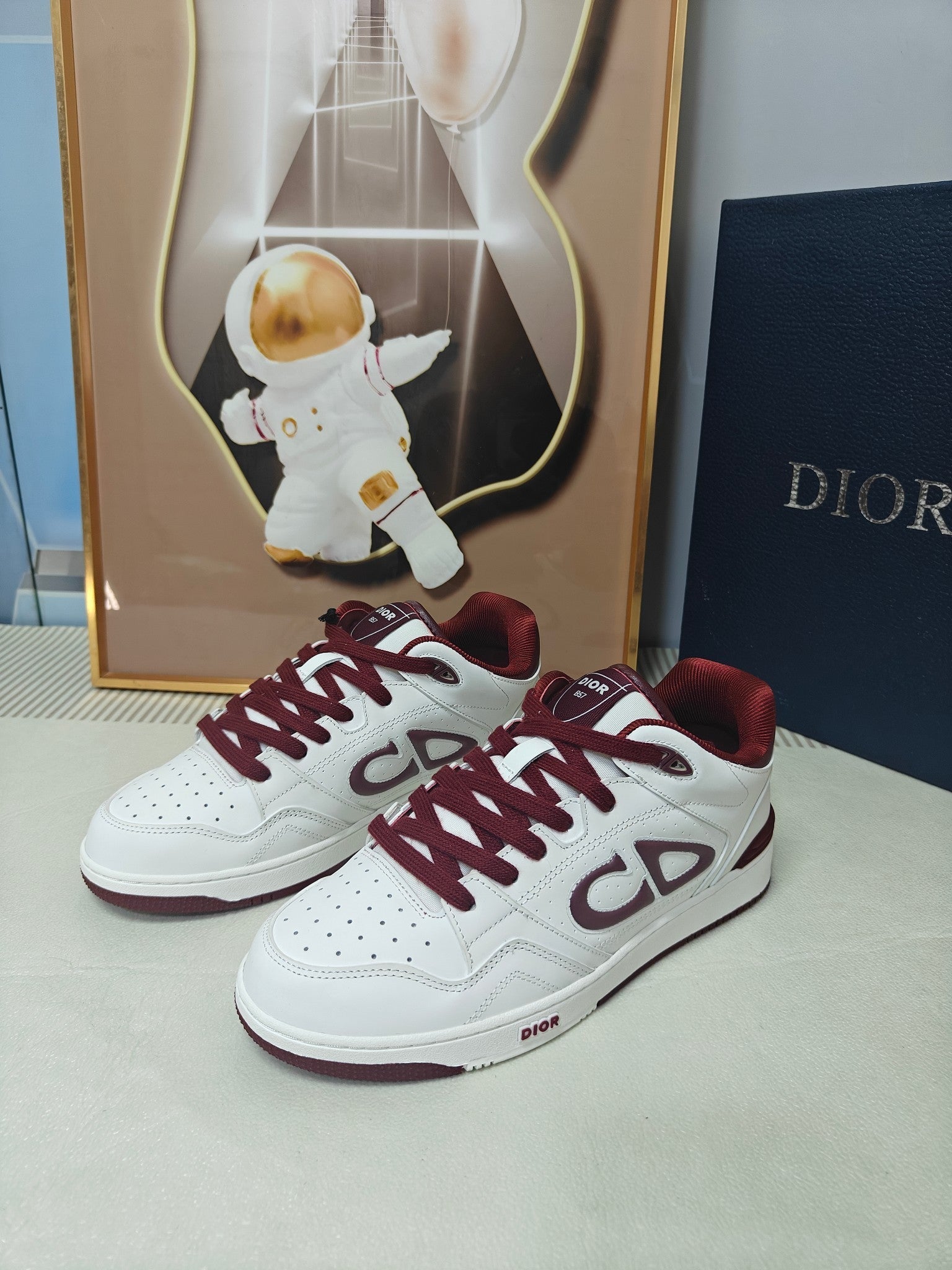 DIOR 26S LOW-TOP SNEAKER IN WHITE AND DARK RED CALFSKIN